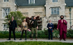 From L to R: Nestor Carbonell, Sarah Michelle Gellar, Shawn Hatosy, Elijah Wood, and Nadeem Umar-Khitab in READY OR NOT 2: HERE I COME. Photo by Searchlight Pictures/Pief Weyman, Courtesy of Searchlight Pictures. © 2026 Searchlight Pictures. All Rights Reserved.