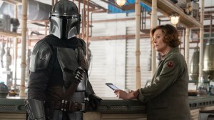 Pedro Pascal and Signourney Weaver star in THE MANDALORIAN AND GROGU